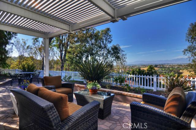 PANORAMIC MOUNTAIN AND CITY LIGHTS VIEWS - Sit on this paved patio and enjoy this beautiful view. Serene and Private - 23591 Lochlomond Street, Laguna Niguel CA 92677 - photo 1