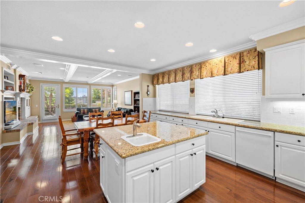 Spectacular Gourmet Kitchen which opens to the Lovely Family Room opens to the Stunning Backyard. - 23611 Trinidad Lane, Laguna Niguel CA 92677 - photo 10