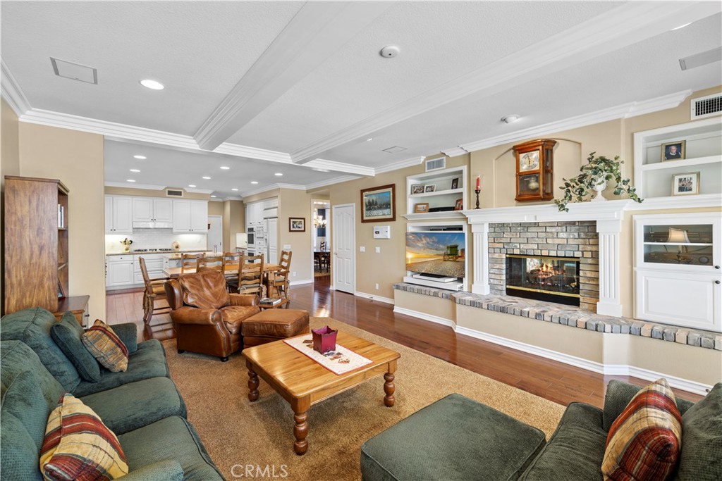 Gorgeous Kitchen with "Walk-In Pantry" opens to the Spacious Family Room with Beautiful Custom Built-In's. - 23611 Trinidad Lane, Laguna Niguel CA 92677 - photo 12
