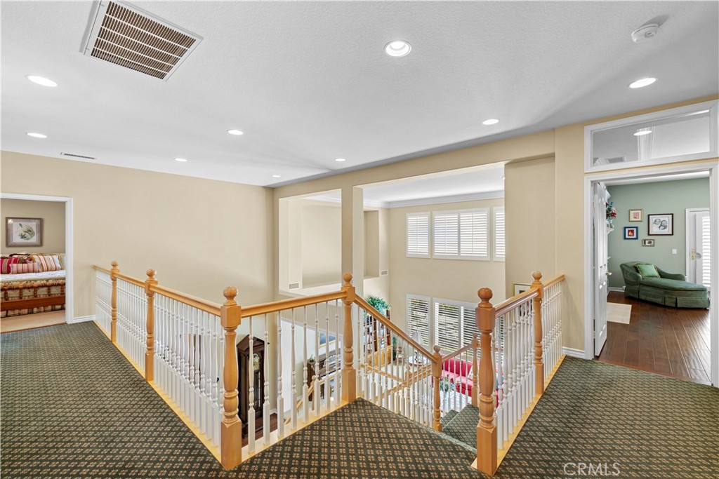Gorgeous Staircase which Leads Upstairs to 3 Additional En-Suites plus an Office. - 23611 Trinidad Lane, Laguna Niguel CA 92677 - photo 22