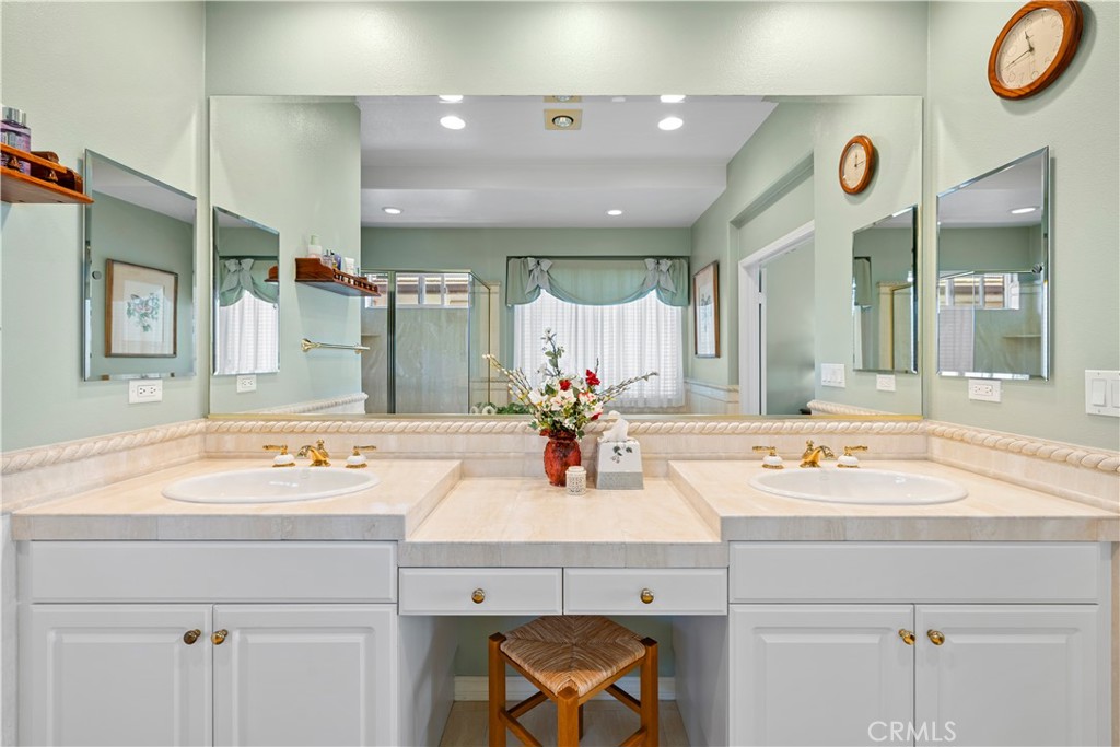Gorgeous Dual Vanity Area Accented in Beautiful Stone. - 23611 Trinidad Lane, Laguna Niguel CA 92677 - photo 26