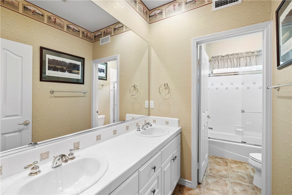 Beautiful Upstairs Full Bath with Dual Vanity Area. - 23611 Trinidad Lane, Laguna Niguel CA 92677 - photo 32