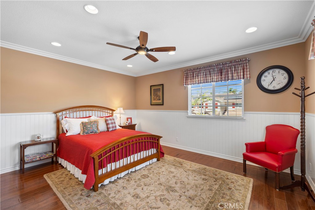 Gorgeous Bedroom with Stunning Wainscoting, Crown Molding and Custom Built-In's. - 23611 Trinidad Lane, Laguna Niguel CA 92677 - photo 34