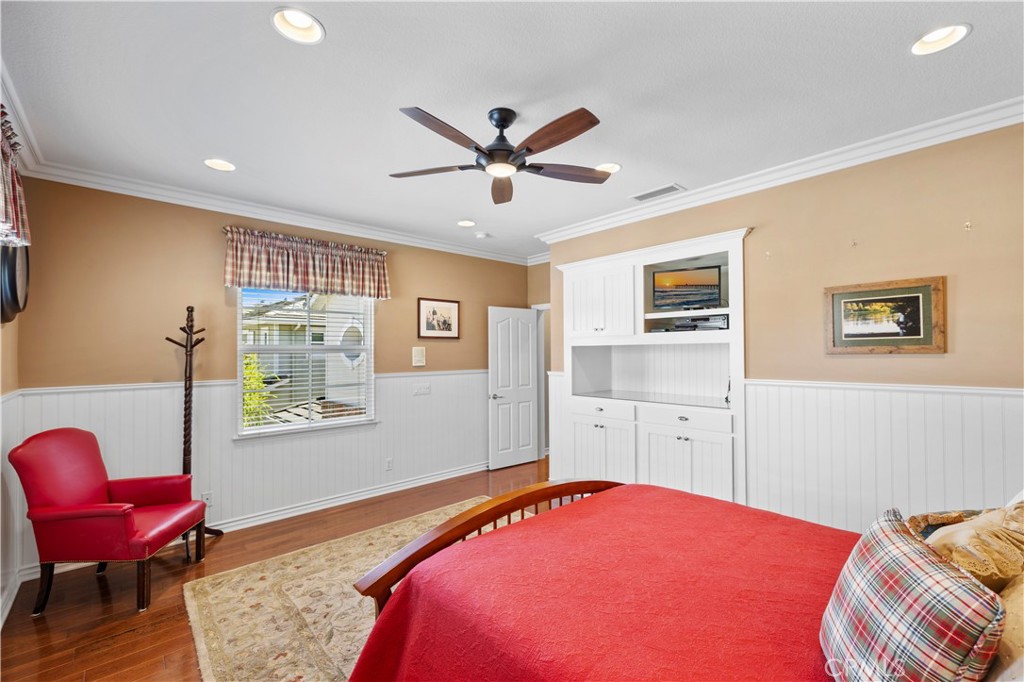 Stunning Built-In's with Wainscoting and Beautiful Ceiling Fan. - 23611 Trinidad Lane, Laguna Niguel CA 92677 - photo 35