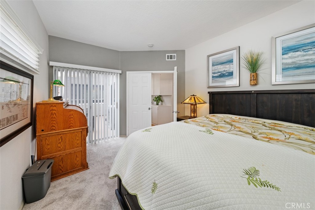 2nd Bedroom has patio access. - 23638 Kingdon Court 88, Laguna Niguel CA 92677 - photo 16
