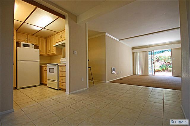 Open dining with front and back patio. - 23732 HILLHURST Drive 27, Laguna Niguel CA 92677 - photo 1