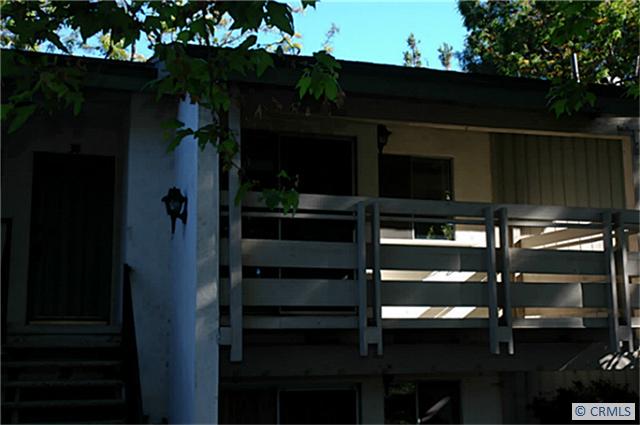 Upper level unit with vaulted ceilings and no noise from above. East facing, near pool and parking areas. Dual balconies - 23732 HILLHURST Drive 30, Laguna Niguel CA 92677 - photo 1