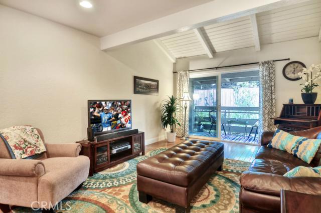 Open, bright and fully upgraded family room. Bamboo floors, double paned, Energy Star doors and windows. - 23732 Hillhurst Drive 68, Laguna Niguel CA 92677 - photo 1