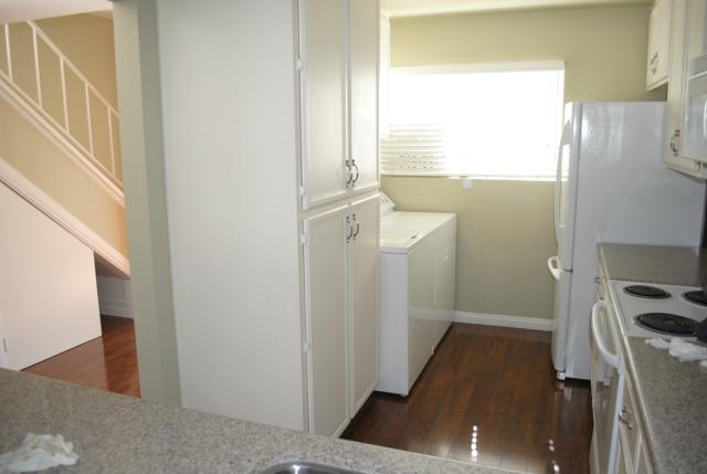 From living room to kitchen and through to hallway and stairs - 23751 N Shore Lane 76, Laguna Niguel CA 92677 - photo 1