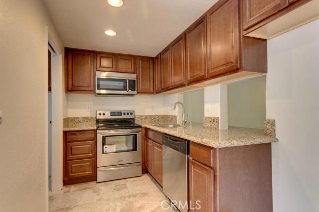 Remodeled with Granite & Stainless Steel Appliances! - 23821 Hillhurst Drive 27, Laguna Niguel CA 92677 - photo 1
