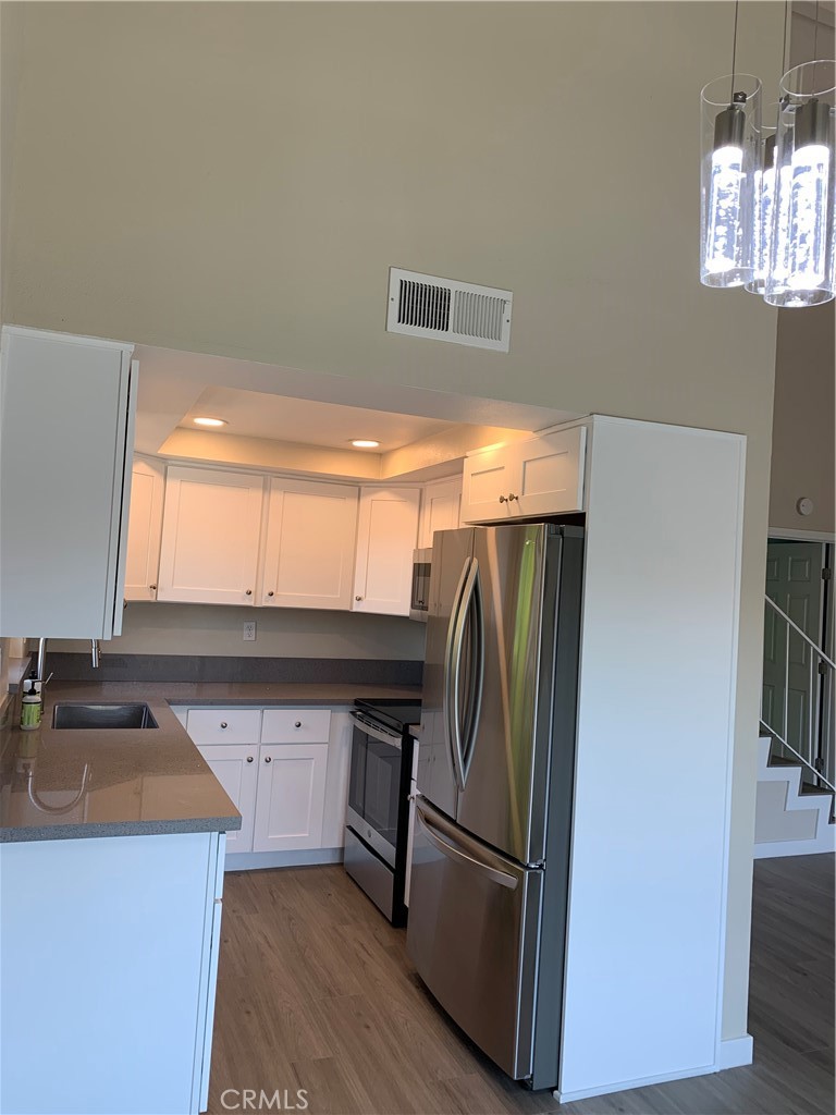 Renovated Kitchen. - 23821 Hillhurst Drive 48, Laguna Niguel CA 92677 - photo 1