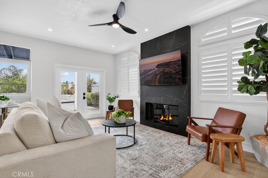 Family room with plantation shutters - 24 Corsica, Laguna Niguel CA 92677 - photo 10