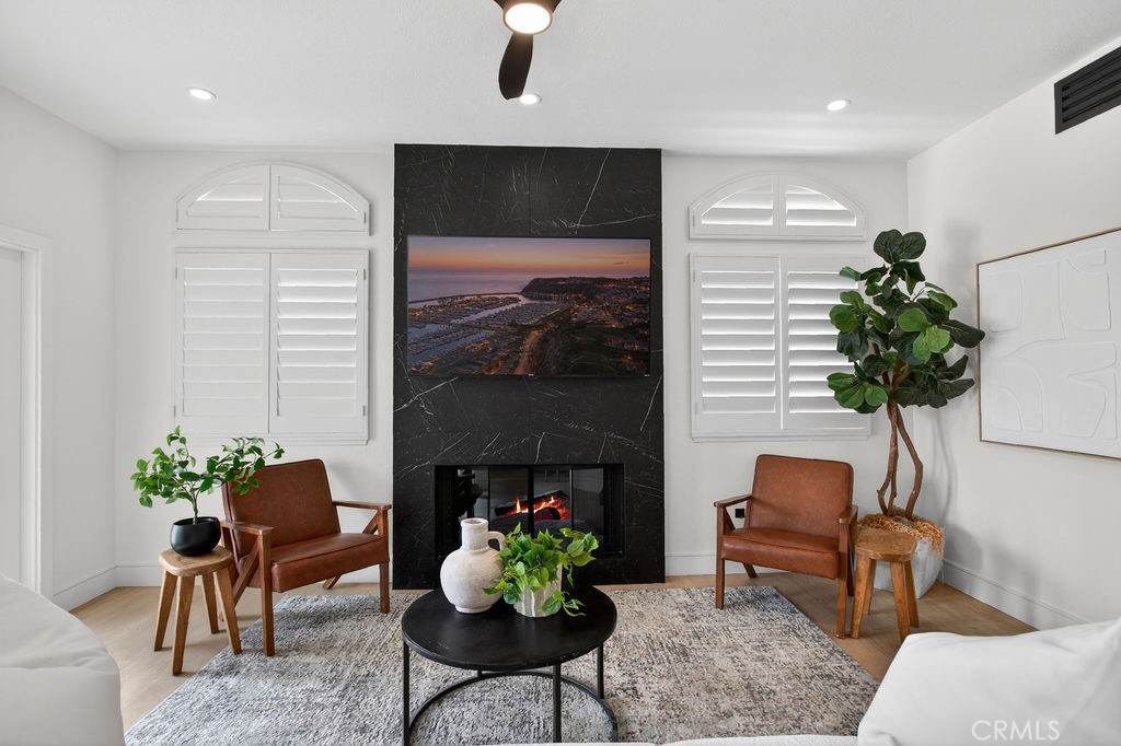 Family room with fireplace - 24 Corsica, Laguna Niguel CA 92677 - photo 11