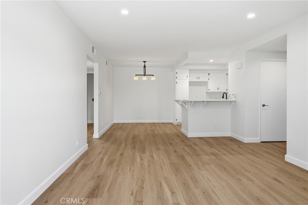 Bright dining area positioned just off the kitchen and surrounded by the home’s newly updated finishes. - 24278 El Pilar, Laguna Niguel CA 92677 - photo 6