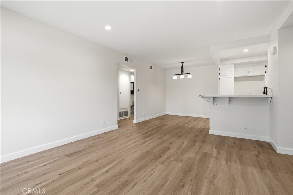 Open living and dining spaces create an easy flow for everyday living and entertaining. - 24278 El Pilar, Laguna Niguel CA 92677 - photo 8