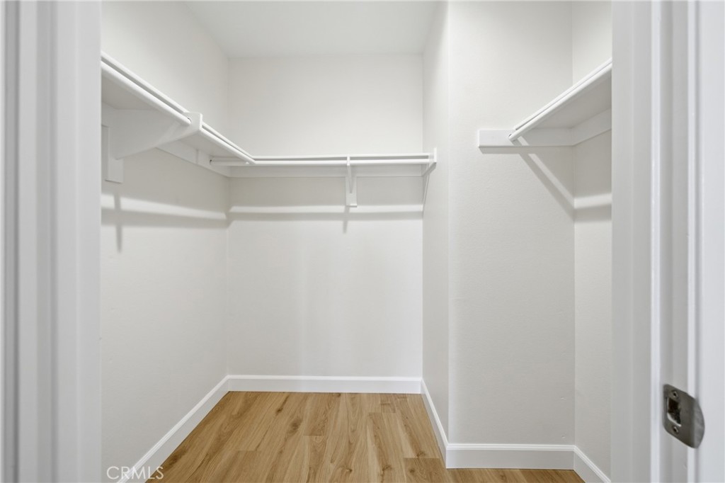 Generous walk-in closet provides valuable storage rarely found in a home of this size. - 24278 El Pilar, Laguna Niguel CA 92677 - photo 12