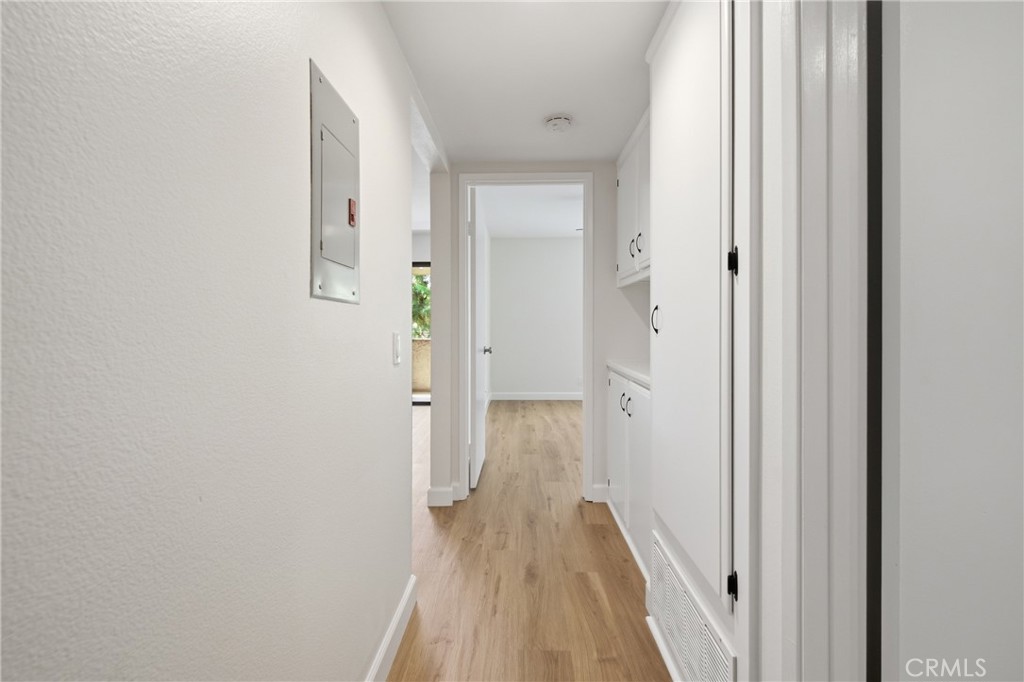New luxury vinyl plank flooring, fresh paint and new baseboards continue throughout the home for a cohesive, move-in-rea - 24278 El Pilar, Laguna Niguel CA 92677 - photo 13