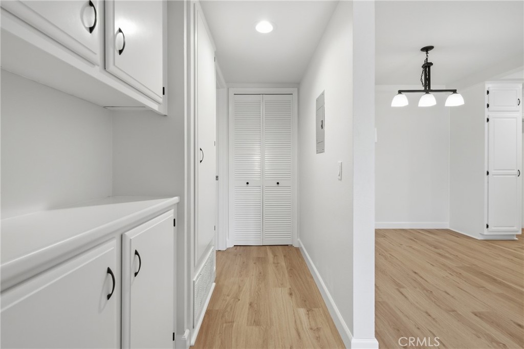 Convenient interior laundry closet with washer and electric dryer hookups—no shared laundry trips required. - 24278 El Pilar, Laguna Niguel CA 92677 - photo 14
