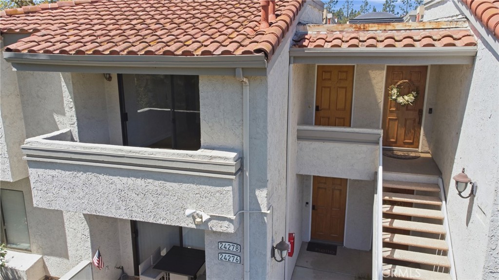 Private patio creates an inviting outdoor retreat with peaceful views of the neighboring park and greenbelt. - 24278 El Pilar, Laguna Niguel CA 92677 - photo 17