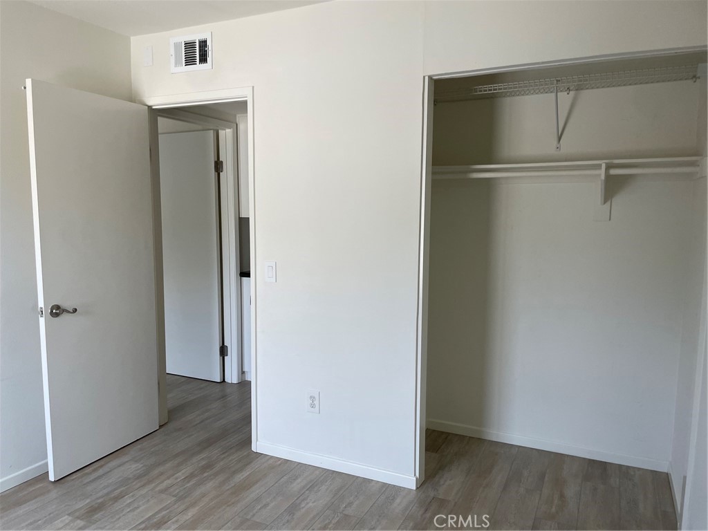 second bedroom is also has vinyl flooring - 24298 El Pilar, Laguna Niguel CA 92677 - photo 23