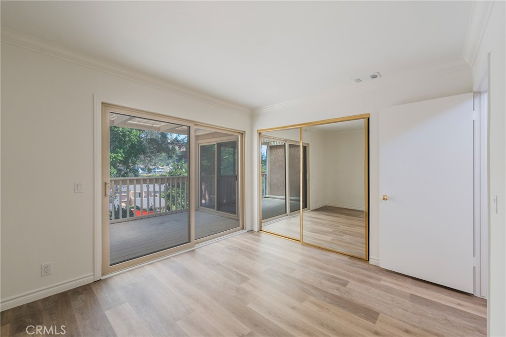 2nd Bedroom with Mirror Closet doors & Slider to Balcony - 24356 Hillview, Laguna Niguel CA 92677 - photo 24