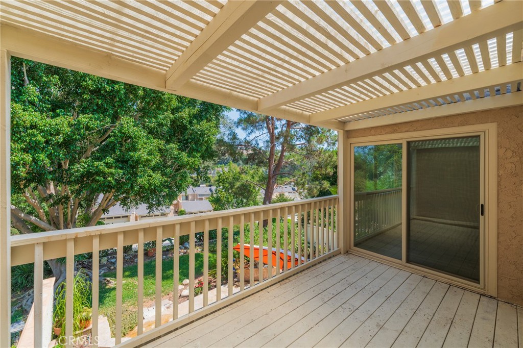 Balcony showing slider to Master Bedroom, showing Backyard - 24356 Hillview, Laguna Niguel CA 92677 - photo 26