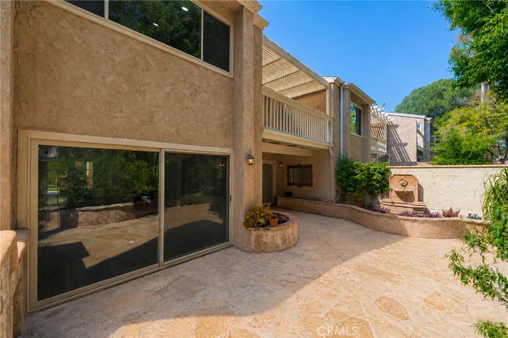 Spacious rear patio with direct access from the living room through oversized sliding glass doors. - 24356 Hillview, Laguna Niguel CA 92677 - photo 31