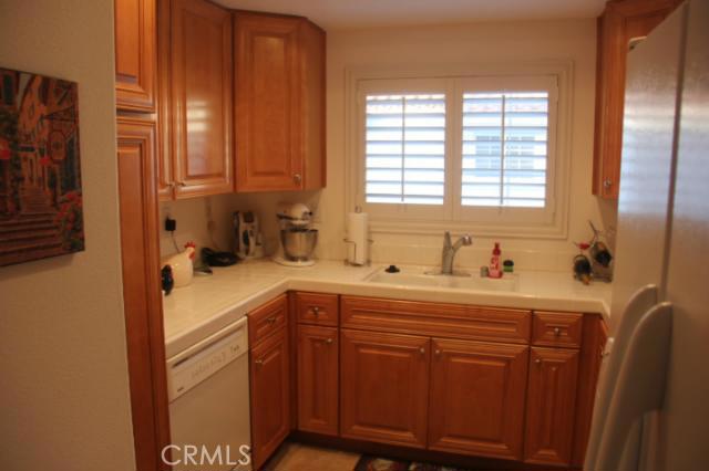 Upgraded kitchen with Maple Cabinets, Gas Range and Built-In Microwave & Dishwasher - 24486 Jeanine Drive, Laguna Niguel CA 92677 - photo 1