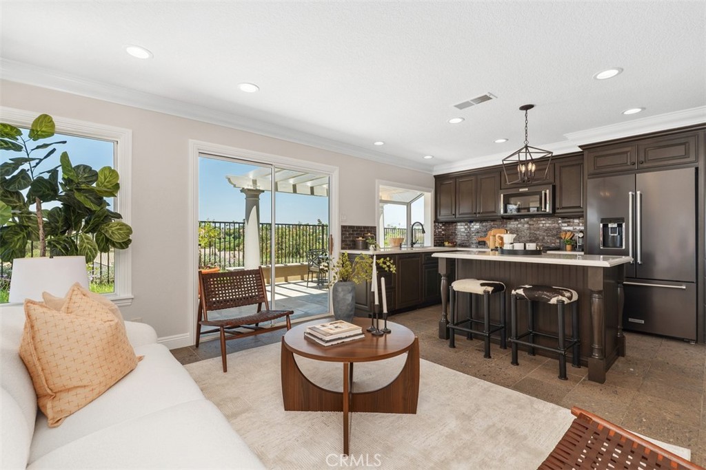Family room and kitchen - 24671 El Manzano, Laguna Niguel CA 92677 - photo 14