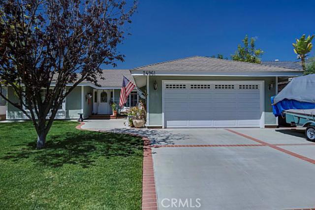 Nice curb appeal. Wide driveway with upgraded roll up garage door. - 24961 La Vida Drive, Laguna Niguel CA 92677 - photo 1