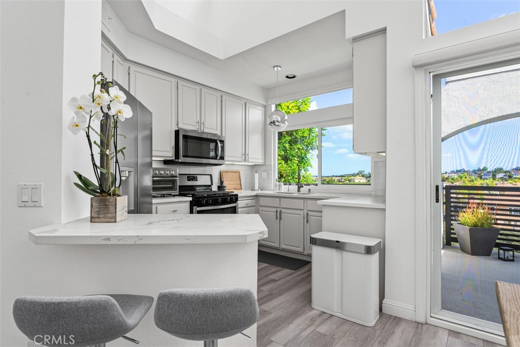 kitchen/bar with a view - 24997 La Mangusta, Laguna Niguel CA 92677 - photo 14