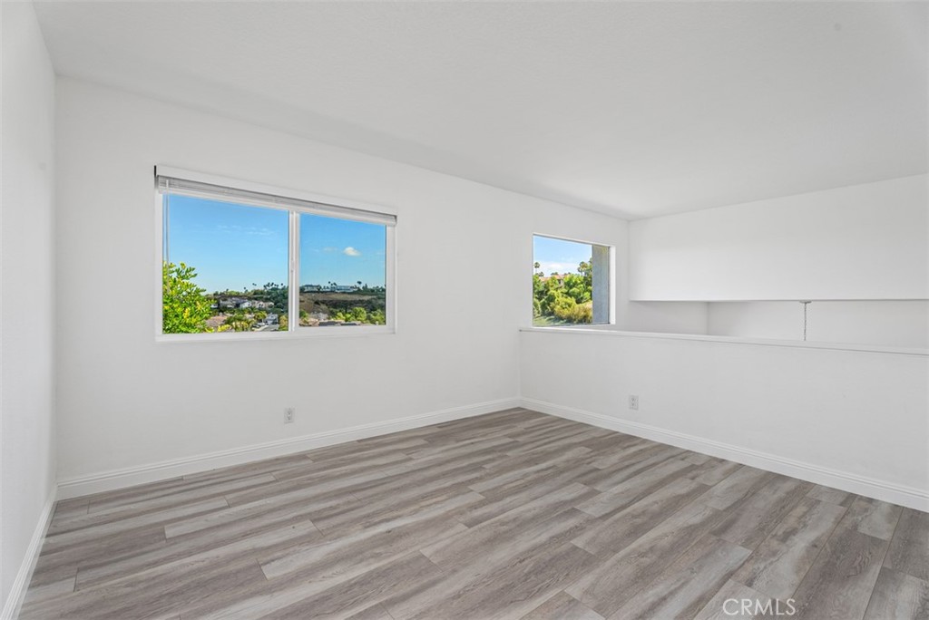 upstairs bedroom/loft with updated bathroom - 24997 La Mangusta, Laguna Niguel CA 92677 - photo 28