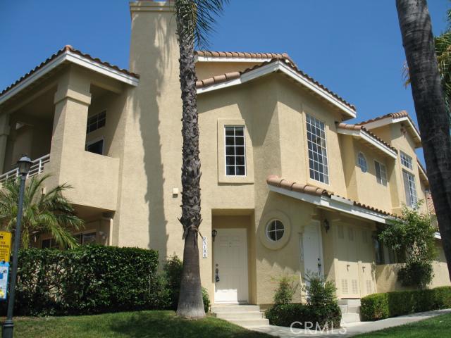 Outside of this picture-perfect carriage unit. Entry,with staircase,is door to right of the porthole window. Upper left - 25182 Via Azul, Laguna Niguel CA 92677 - photo 1