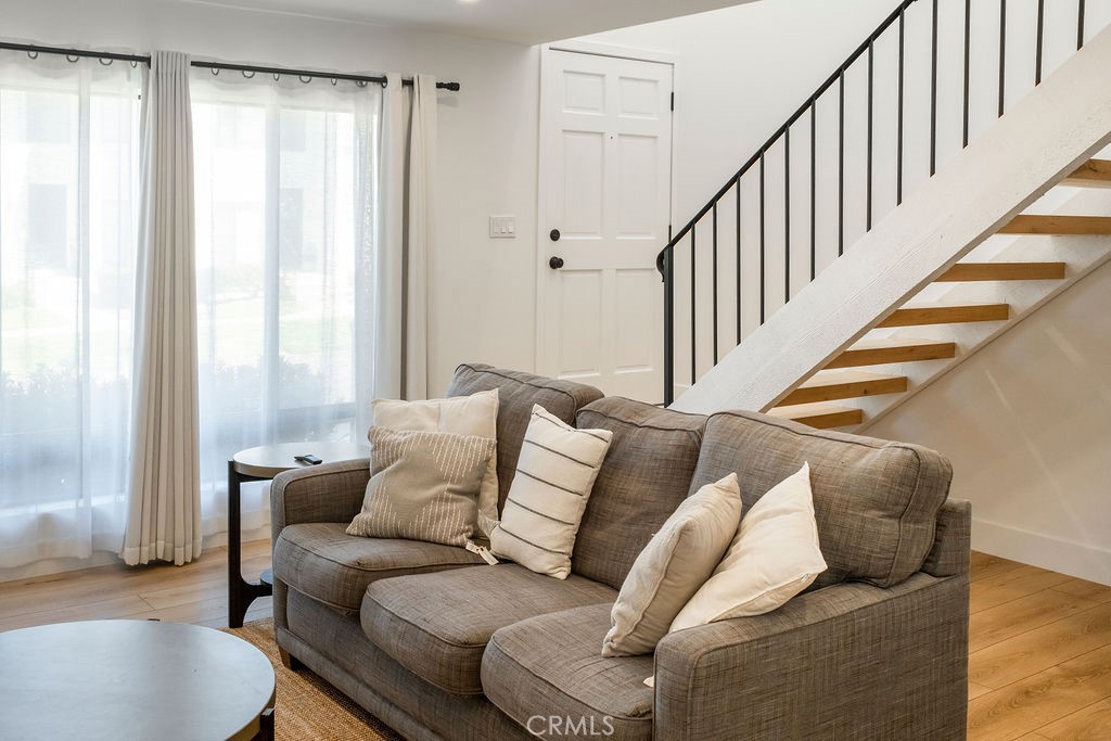 Living room with sheers closed - 25655 Paseo La Cresta 47, Laguna Niguel CA 92677 - photo 5
