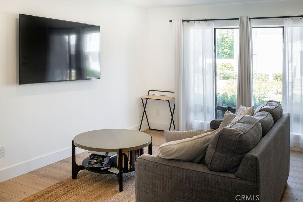 Living room showing included flat panel TV - 25655 Paseo La Cresta 47, Laguna Niguel CA 92677 - photo 6