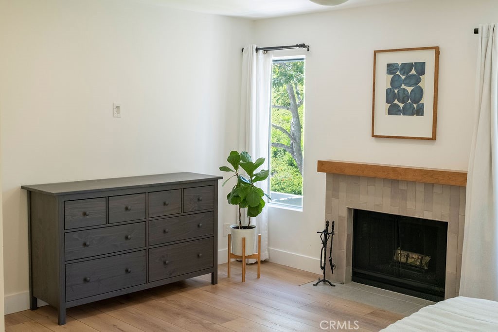 Thoughtfully recessed fireplace hearth and redesigned mantle. - 25655 Paseo La Cresta 47, Laguna Niguel CA 92677 - photo 30