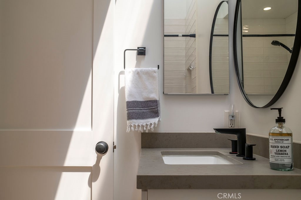 View of upstairs bathroom showing sunlight from vaulted skylight. - 25655 Paseo La Cresta 47, Laguna Niguel CA 92677 - photo 33