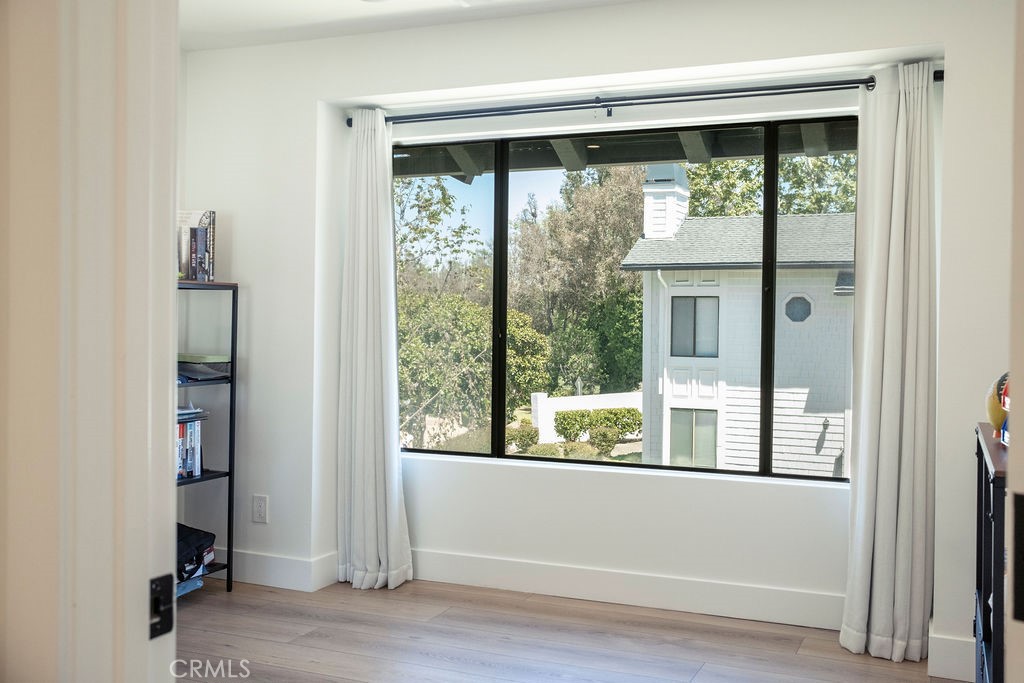 Large windows in secondary bedroom. - 25655 Paseo La Cresta 47, Laguna Niguel CA 92677 - photo 37