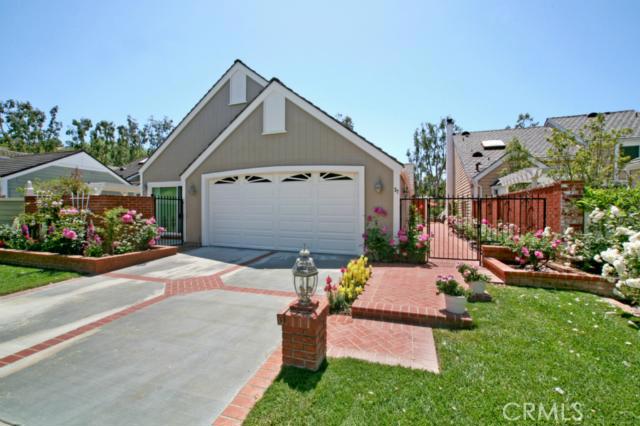 Front view of Home with Rose Garden entry - 27 Bellingham Place, Laguna Niguel CA 92677 - photo 1