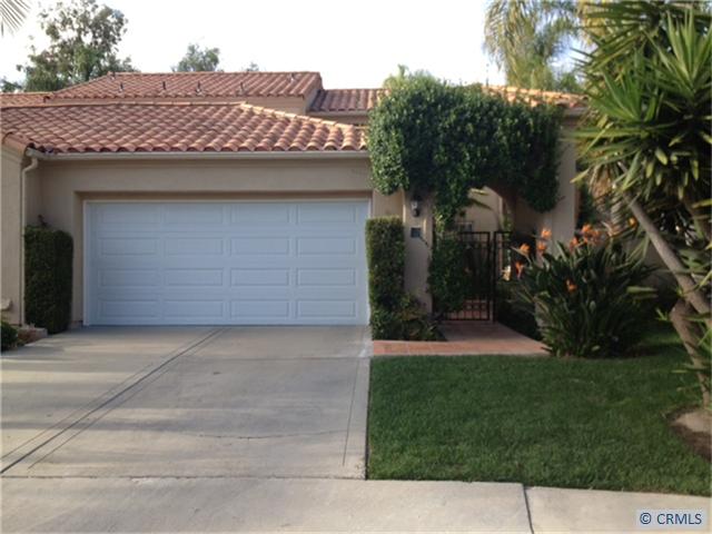 Front of home, with enclosed gated entry. - 27 MERCATO, Laguna Niguel CA 92677 - photo 1