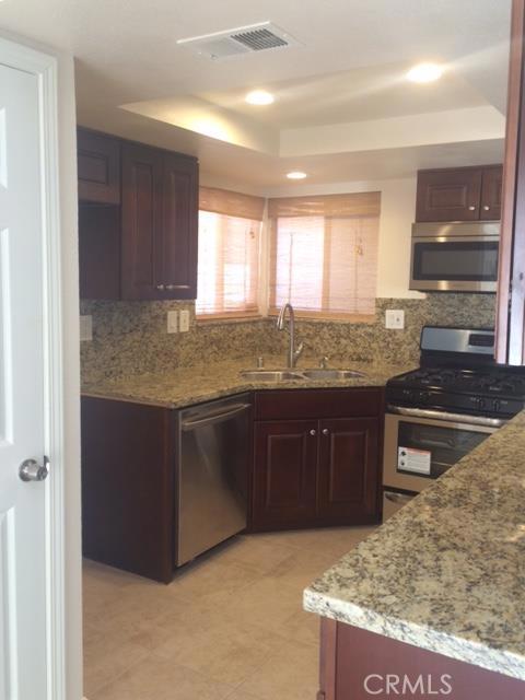 Granite countertops and brand new appliances - 28101 Mariposa 206, Laguna Niguel CA 92677 - photo 1