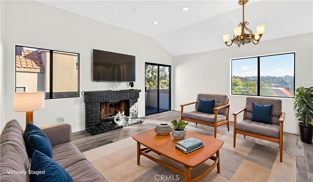 Living Room View from Main hallway - Virtually staged - 28112 Mariposa 168, Laguna Niguel CA 92677 - photo 1