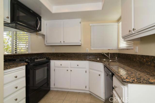Beautiful Top Grade "Baltic Brown" Granite with a Double Ogee edge! - 28161 Montecito 44, Laguna Niguel CA 92677 - photo 1