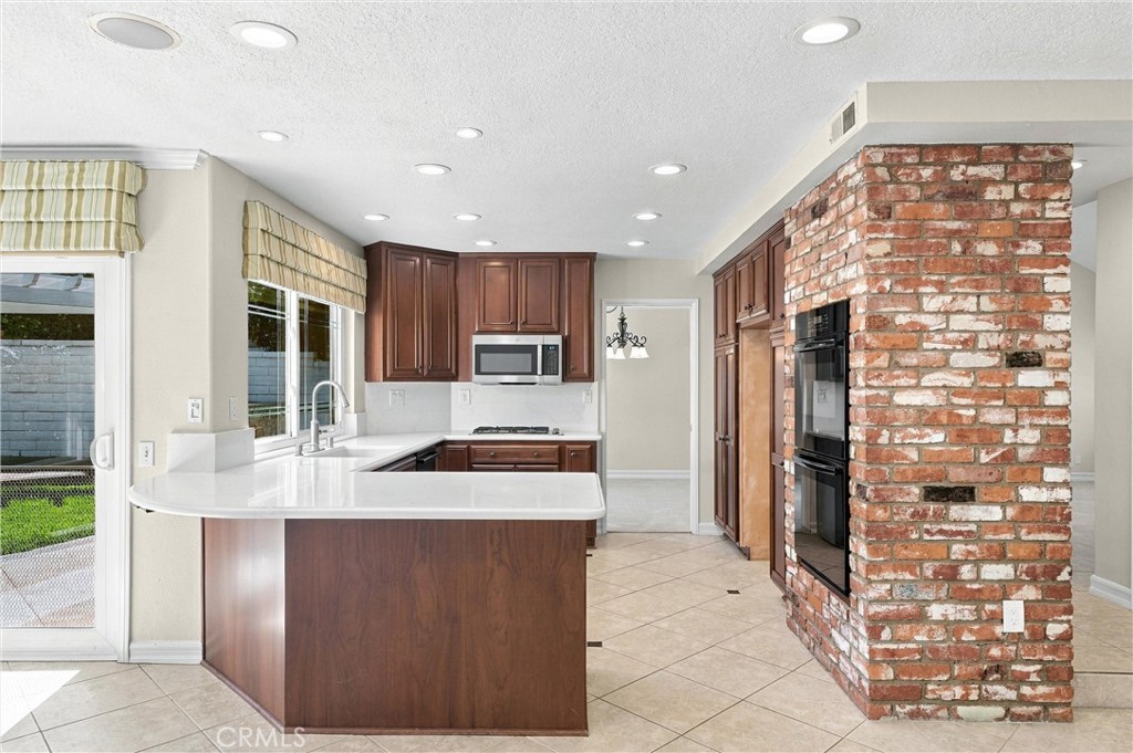 Remodeled kitchen with new white quartz countertops. - 28172 Bluebell Drive, Laguna Niguel CA 92677 - photo 6