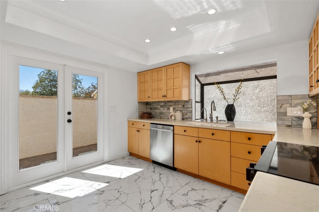 Kitchen opens to courtyard - 28182 Carpenteria Court, Laguna Niguel CA 92677 - photo 16