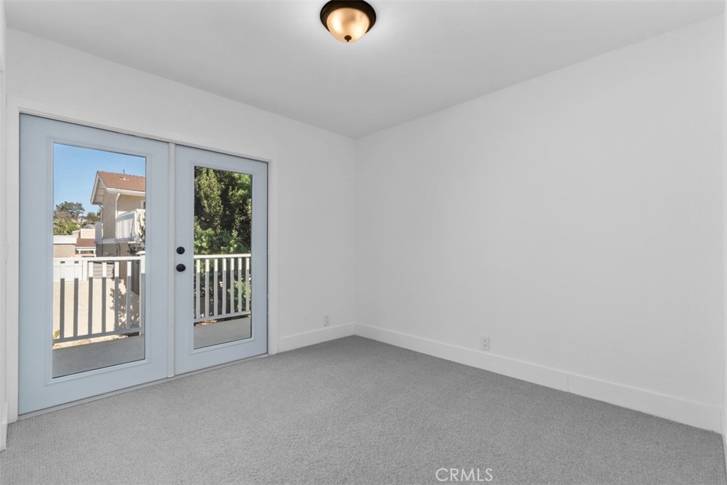 Bedroom 2 opens to balcony - 28182 Carpenteria Court, Laguna Niguel CA 92677 - photo 23