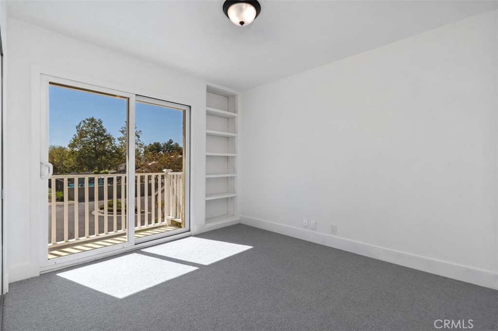 Bedroom 3 opens to balcony - 28182 Carpenteria Court, Laguna Niguel CA 92677 - photo 27