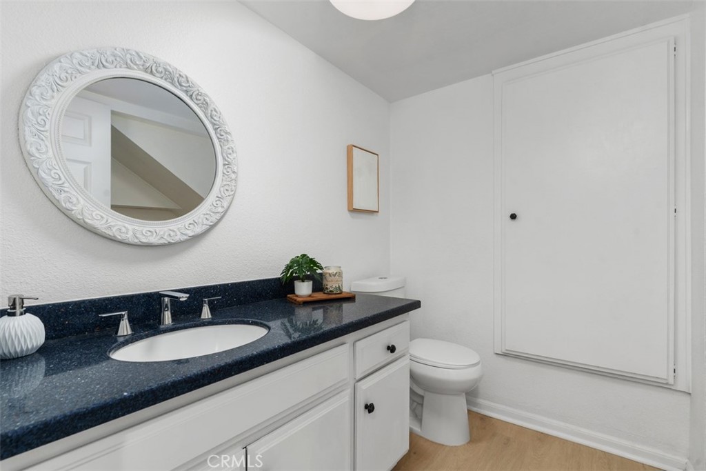 Downstairs half bath and laundry room - 28182 Carpenteria Court, Laguna Niguel CA 92677 - photo 30