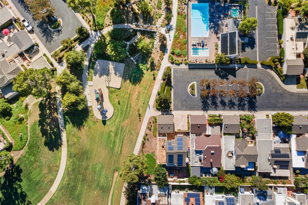 Home is adjacent to the grassy fields, play structure, and pool. Family members may come and go as they please to enjoy - 28182 Carpenteria Court, Laguna Niguel CA 92677 - photo 39