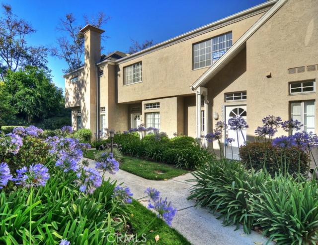 Meandering walkways lead to your front door, with guest parking located nearby and easy to find. - 28275 Paseo El Siena, Laguna Niguel CA 92677 - photo 1